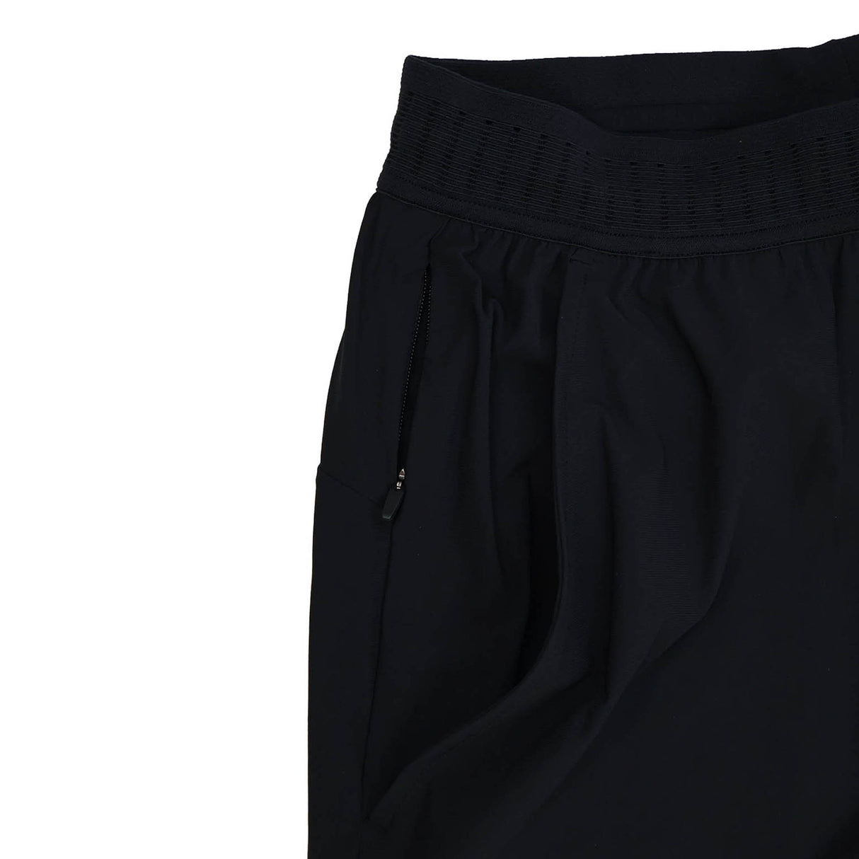The Ireland 25/26 Gym Training Pant by Canterbury is displayed on a plain white background, photographed from the waist to the thigh. These black athletic pants feature an elastic waistband and a zippered pocket, taking inspiration from Ireland Rugby training wear.