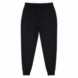 The Ireland 25/26 Gym Training Pant by Canterbury is laid flat on a white background, showcasing an elastic waistband and cuffed ankles, designed for a sporty yet comfortable look inspired by classic Ireland Rugby training wear.
