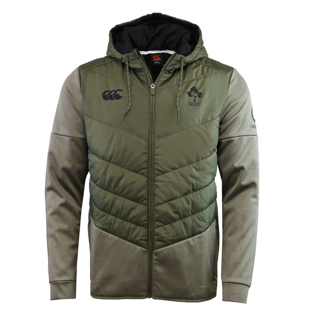 The Canterbury Ireland 25/26 Hybrid Padded Jacket features a quilted olive green front, grey sleeves and hood, IRFU and Canterbury chest logos, and ThermoReg technology for extra warmth in a stylish two-tone zip-up design.