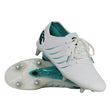 Canterbury Phoenix 2.0 Elite SG white soft-ground rugby boot with green accents and metallic screw-in studs.
