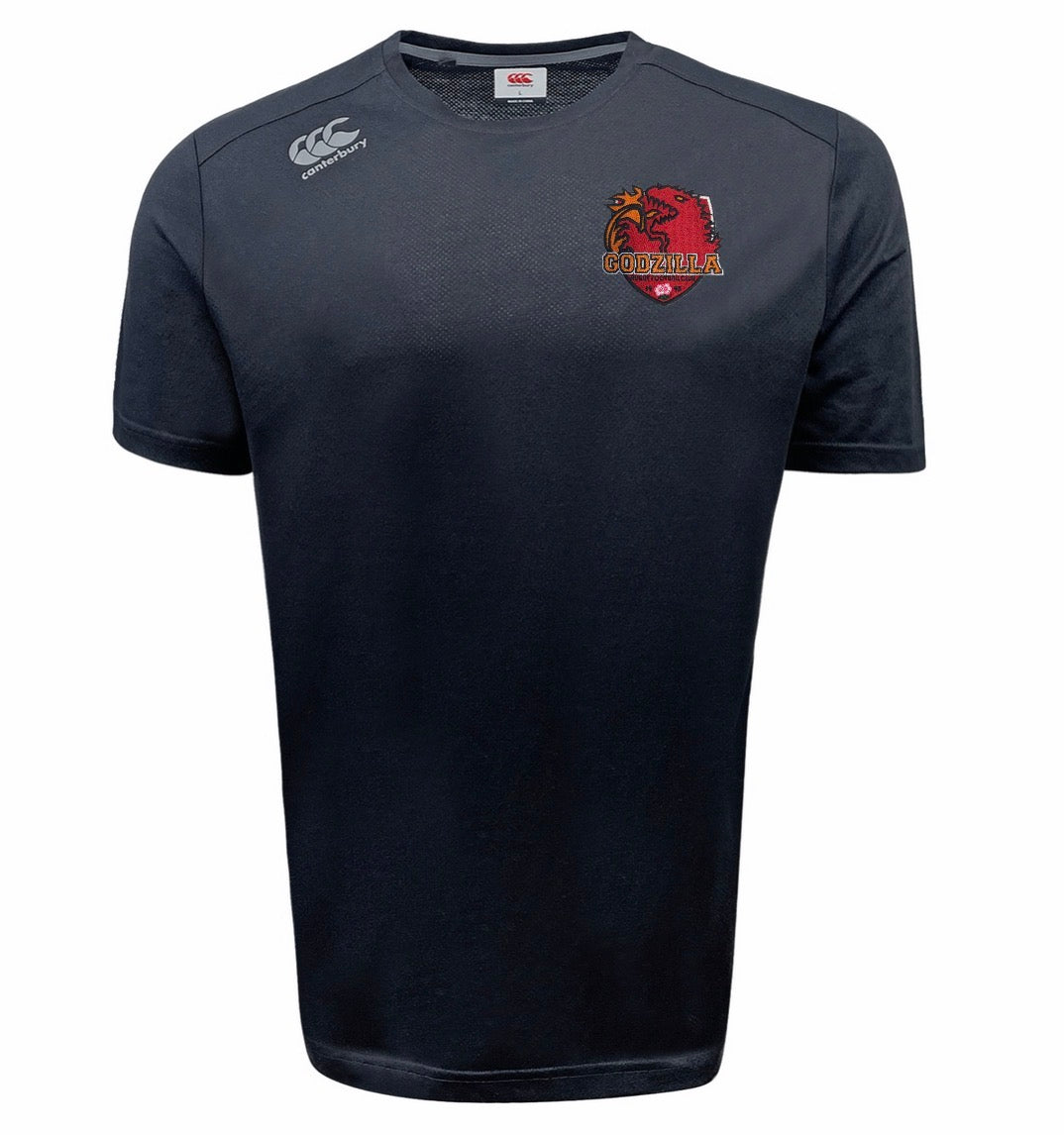 The EMB Canterbury Godzilla RFC Embroidered Club Tempo Vapodri T-Shirt is a navy blue short-sleeve athletic top featuring a red and yellow Godzilla RFC logo on the left chest and a white embroidered Canterbury logo on the right shoulder; this moisture-wicking sports tee blends advanced performance technology with classic style.