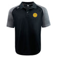 The West Chester University Elite Polo by EMB Canterbury features black and grey short sleeves, lightweight Vapodri fabric, a yellow circular left chest logo, and brand logos on the shoulders.