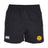 The West Chester University Advantage Rugby Shorts by EMB Canterbury feature an elastic waistband, Canterbury logo on the left leg, yellow circular badge on the right, and moisture-wicking fabric for comfort on and off the field.