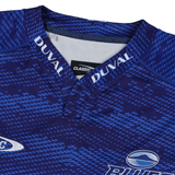 Close-up of the Blues Super Rugby Home Jersey 24 by Classic Sportswear, a blue sports jersey made from moisture-wicking fabric, featuring a dynamic pattern design and "DUVAL" elegantly inscribed on the collar.