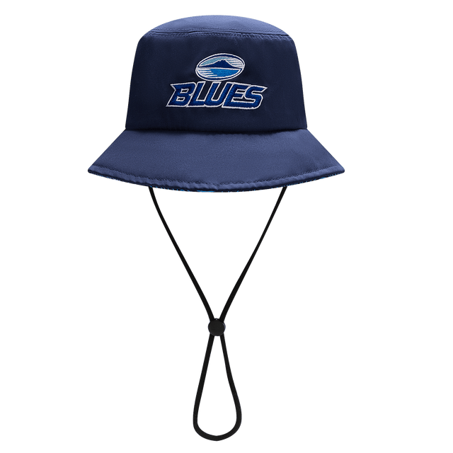 The Blues Super Rugby 25/26 Bucket Hat by Classic Sportswear, in navy blue, features "Blues" and a wave logo on the front. It includes an adjustable chin strap for the perfect fit.