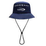 The Blues Super Rugby 25/26 Bucket Hat by Classic Sportswear features a chin strap, "Classic" and "EST '96" text, adorned with five stars for a timeless sportswear appeal.