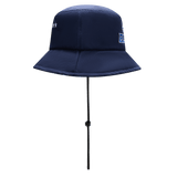 The Blues Super Rugby 25/26 Bucket Hat, by Classic Sportswear, combines classic sportswear with style, featuring a navy blue design with a wide brim, adjustable chin strap, and embroidered logos on the front and side.
