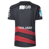 Back view of the Crusaders Super Rugby Replica Away Jersey 25/26 by Classic Sportswear, showcasing "GIB" and "COOLABAH" text. This black and red design includes red diagonal stripes and sleeve logos on a transparent background.