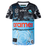The Sharks Indigenous NRL 25/26 Replica Jersey by Classic Sportswear features Indigenous-inspired black, blue, and white patterns, with "Aramex" and "Pilot" sponsor logos on the front and the Sharks team logo on the chest.