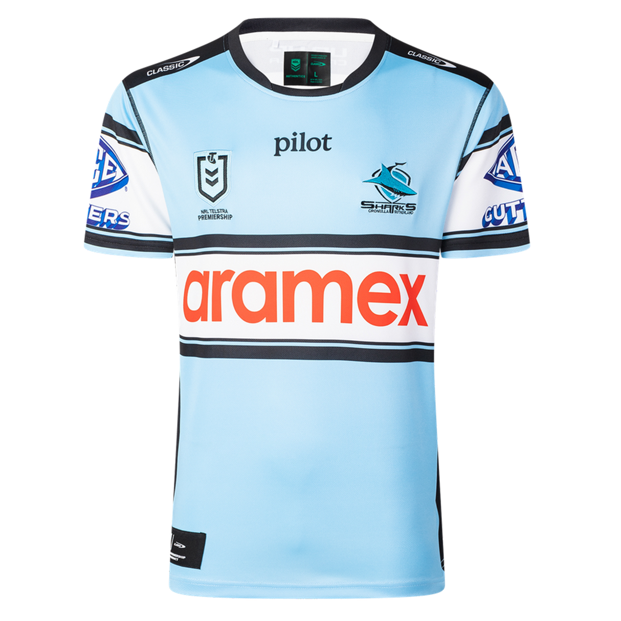 The Sharks NRL 26/27 Replica Home Jersey by Classic Sportswear is light blue with black, white, and blue stripes, featuring the Cronulla Sharks logo, NRL Premiership logo, and "aramex" sponsor across the chest.