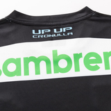 Close-up of the back of the Sharks NRL 26/27 Replica Home Jersey by Classic Sportswear, showing “UP UP CRONULLA” in white and blue above part of a green logo.
