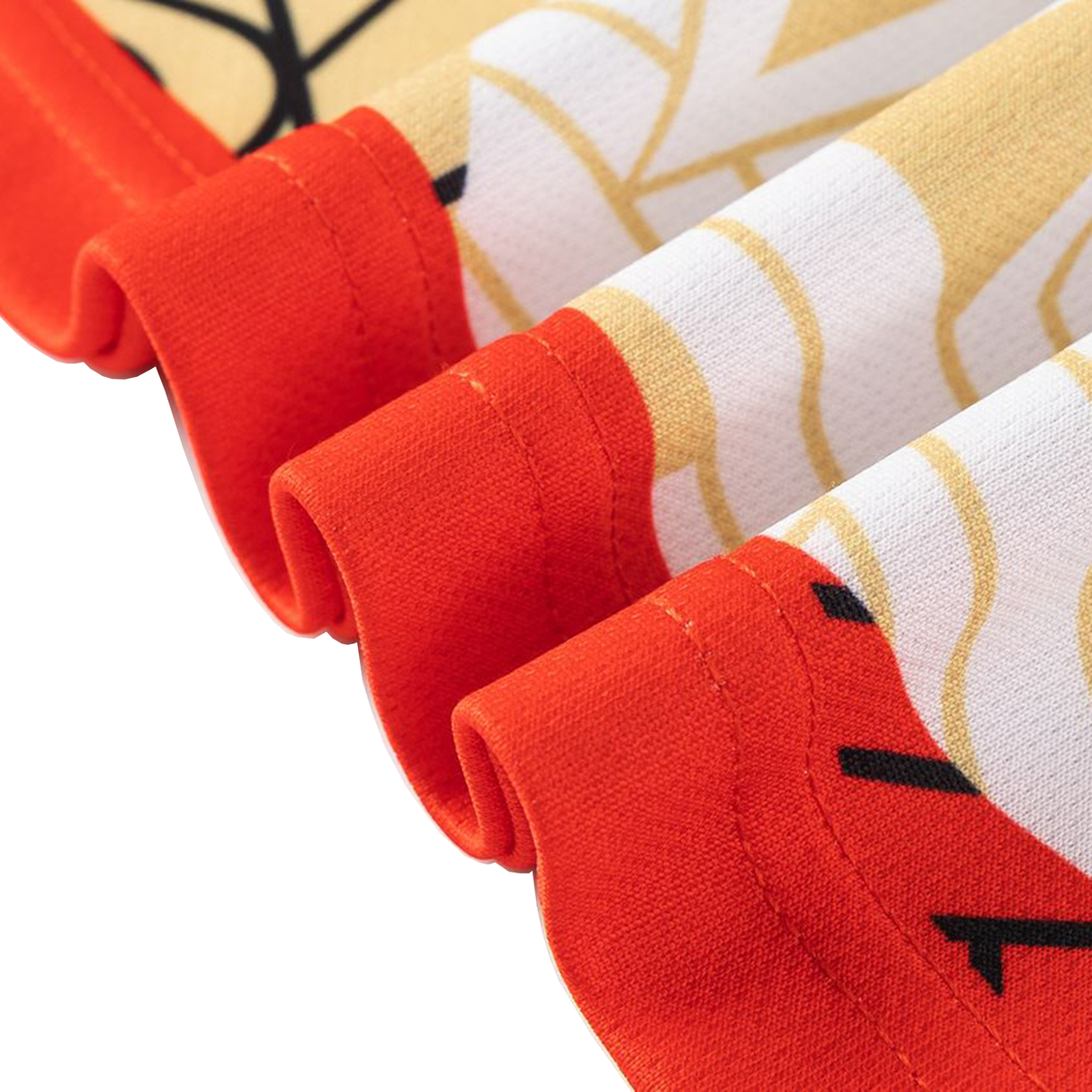 Close-up of the Dolphins Indigenous NRL 25/26 Replica Jersey by Classic Sportswear, featuring a yellow, black, and white pattern with neatly folded red hems and visible stitching.