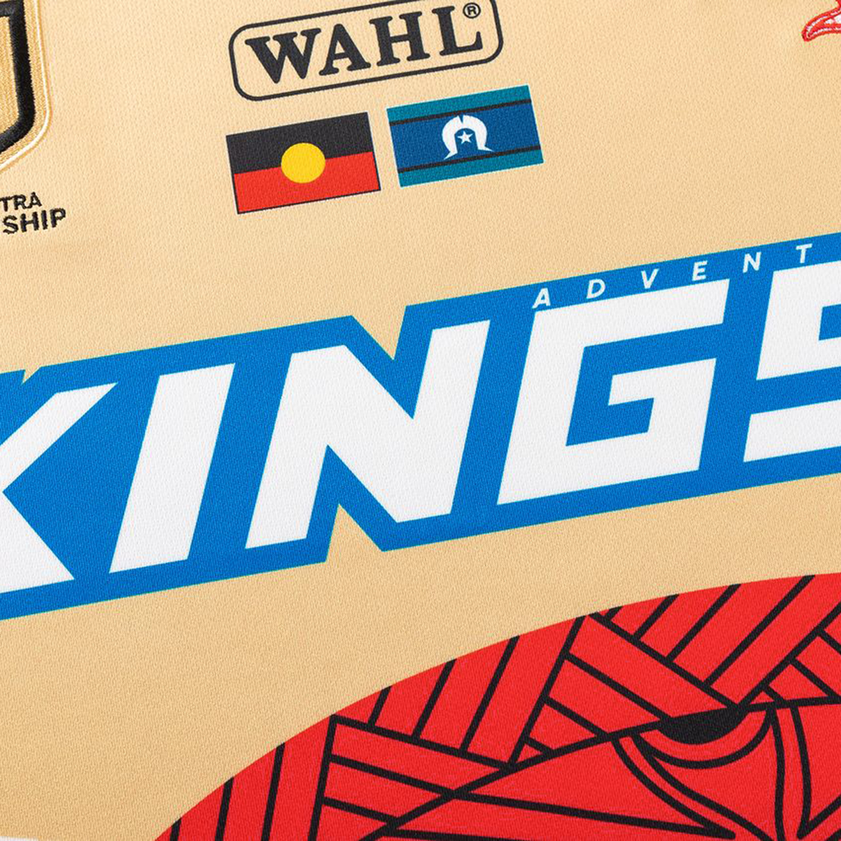 Close-up of the Dolphins Indigenous NRL 25/26 Replica Jersey by Classic Sportswear, featuring "KINGS," Indigenous and Torres Strait Islander flags, and sponsor logos—a standout choice for fans wanting a unique sports jersey.