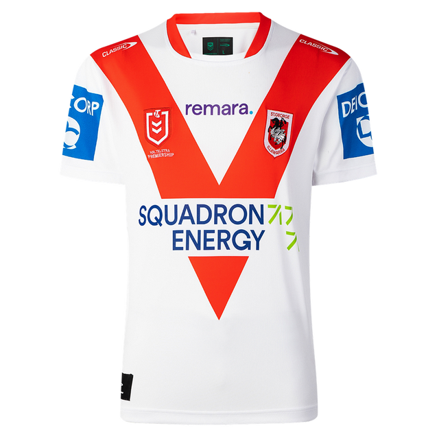 The Dragons NRL 26/27 Replica Home Jersey by Classic Sportswear features classic white with red V-stripes, sponsor logos, and the St. George Illawarra Dragons emblem—a must-have jersey for loyal fans.