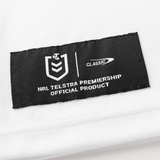 A black label on white fabric reads "NRL Telstra Premiership Official Product" with NRL and Classic Sportswear logos, featured on the Dragons NRL 26/27 Replica Home Jersey by Classic Sportswear.