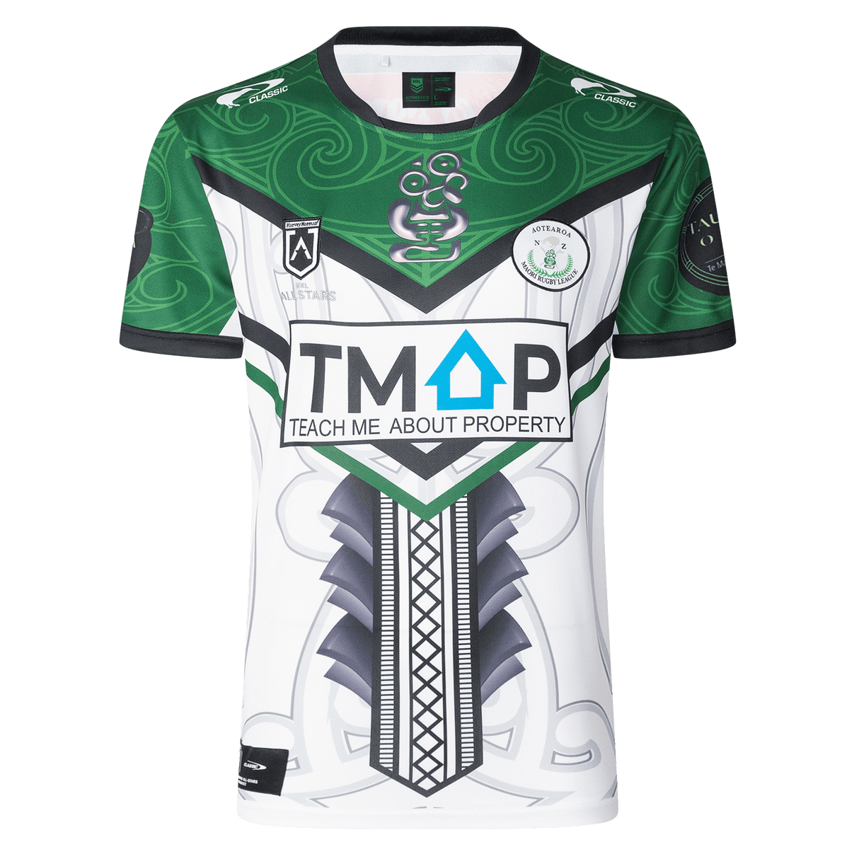 The NRL Maori All Stars 25/26 Replica Home Jersey by Classic Sportswear features a striking green and white Māori-inspired design. Adorned with logos and "TEACH ME ABOUT PROPERTY" text, it uses anti-microbial wickable fabric to display vibrant, lasting sublimated graphics.