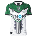 The NRL Maori All Stars 25/26 Replica Home Jersey by Classic Sportswear features a striking green and white Māori-inspired design. Adorned with logos and "TEACH ME ABOUT PROPERTY" text, it uses anti-microbial wickable fabric to display vibrant, lasting sublimated graphics.