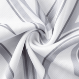 Close-up of a Classic Sportswear NRL Maori All Stars 25/26 Replica Home Jersey, featuring textured white and gray fabric with a swirl pattern, showcasing sublimated graphics and intersecting lines.
