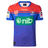 A blue and red sports jersey with the text "nib" displayed prominently on the front. This Knights NRL Heritage Jersey by Classic Sportswear, adorned with several sponsor logos, proudly showcases the team emblem of the Newcastle Knights.