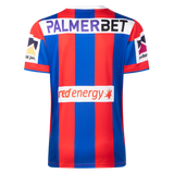 The Knights NRL 26/27 Replica Home Jersey by Classic Sportswear features red and blue vertical stripes, sponsor logos including "PALMERBET" and "red energy," and is styled as an official Newcastle Knights jersey.