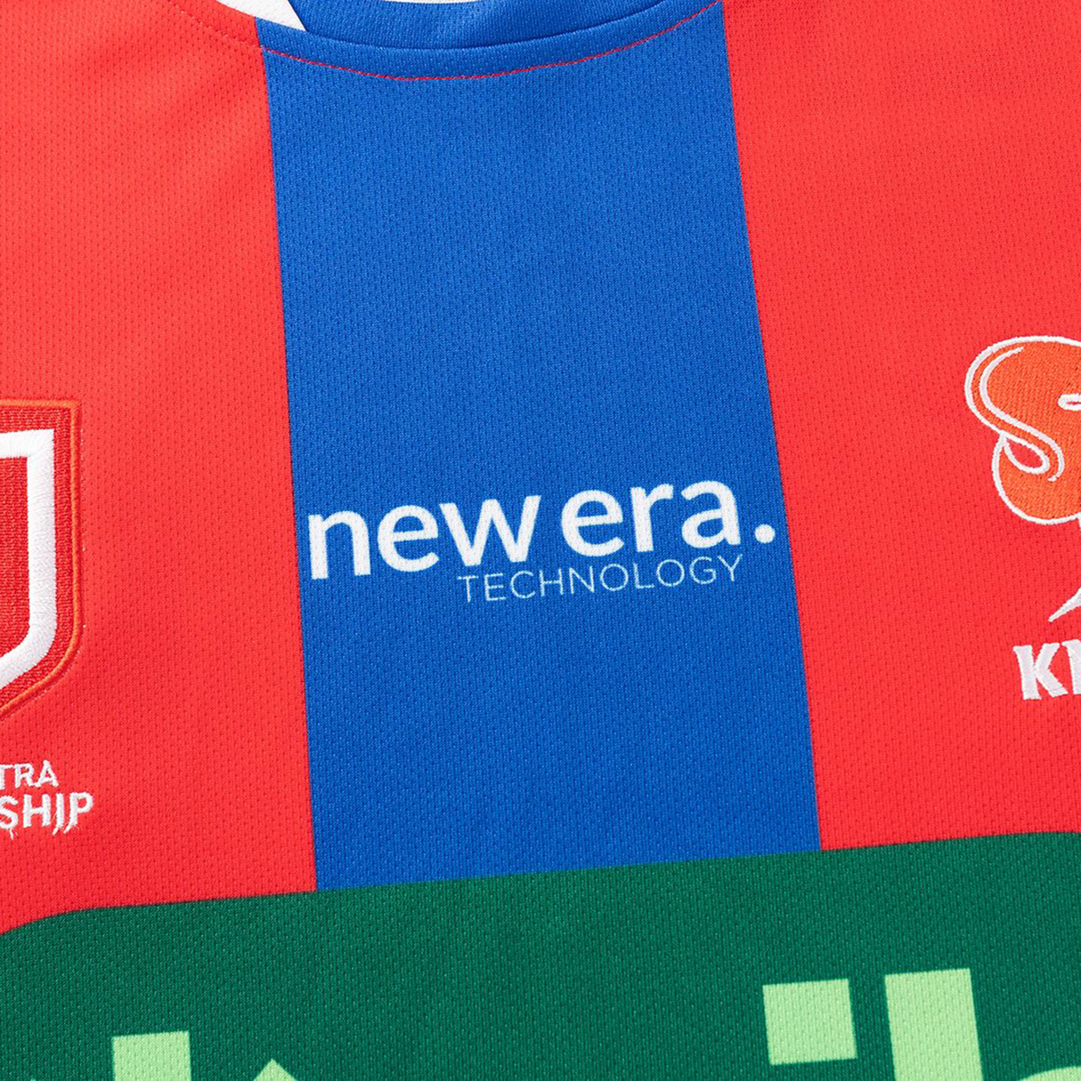 Close-up of the Knights NRL 26/27 Replica Home Jersey by Classic Sportswear, showcasing red and blue vertical stripes, moisture-wicking fabric, and "new era. TECHNOLOGY" printed in bold white text across the front.