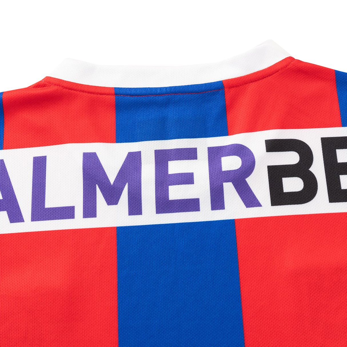 Close-up of the back of a Knights NRL 26/27 Replica Home Jersey by Classic Sportswear, red and blue striped with a white collar and partial "PALMERBE" text visible.