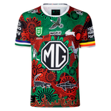 The Rabbitohs Indigenous NRL 25/26 Replica Jersey by Classic Sportswear features Aboriginal-inspired red, green, and black designs, sponsor logos including a large "MG," and is the official Rabbitohs NRL jersey.