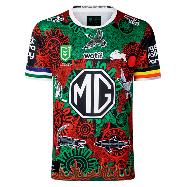 The Rabbitohs Indigenous NRL 25/26 Replica Jersey by Classic Sportswear features Aboriginal-inspired red, green, and black designs, sponsor logos including a large "MG," and is the official Rabbitohs NRL jersey.