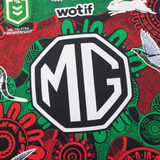 Close-up of the Rabbitohs Indigenous NRL 25/26 Replica Jersey by Classic Sportswear, with a bold MG logo, Aboriginal-inspired designs, animal motifs, and official NRL and sponsor logos.