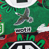 Close-up of the Rabbitohs Indigenous NRL 25/26 Replica Jersey by Classic Sportswear, featuring an indigenous bird, rabbit, green and red dots, and the "wotif" sponsor logo.