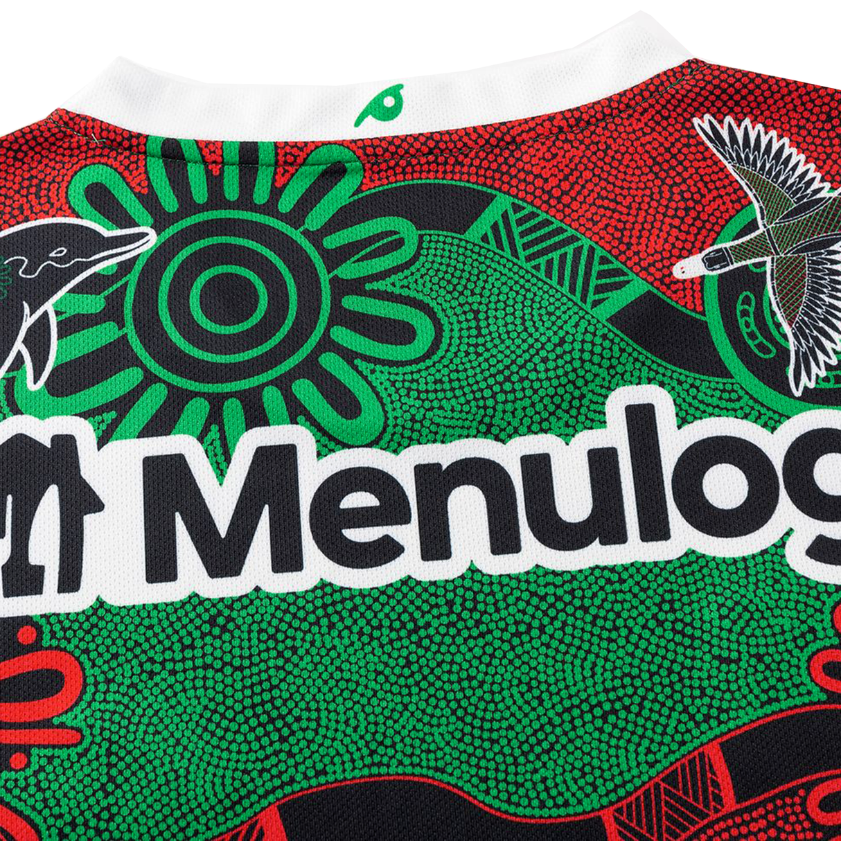 The Rabbitohs Indigenous NRL 25/26 Replica Jersey by Classic Sportswear features Aboriginal dot art in red, green, and black with animal motifs plus a bold Menulog logo on the back—an eye-catching NRL design.