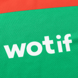 Close-up of a red and green fabric with "wotif" printed in white, similar to the Rabbitohs NRL 25/26 Replica Home Jersey by Classic Sportswear.