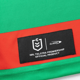 Close-up of a green and red Rabbitohs NRL 25/26 Replica Home Jersey by Classic Sportswear, featuring the official NRL Telstra Premiership label and iconic design.