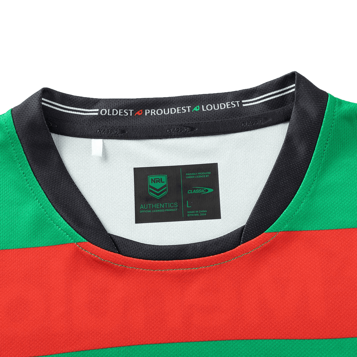 The Rabbitohs NRL 25/26 Replica Home Jersey, crafted by Classic Sportswear in size L, boasts a vibrant red, green, and black design with "OLDEST PROUDEST LOUDEST" inside the collar, capturing team spirit with style and authenticity.