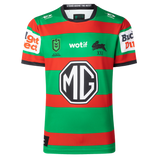 The Rabbitohs NRL 26/27 Replica Home Jersey by Classic Sportswear features red and green stripes, sponsor logos (MG, wotif, Budget Direct), and a black rabbit emblem—an authentic South Sydney home jersey.