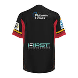 Back view of the Gallagher Chiefs Super Rugby Home Jersey 24 by Classic Sportswear in black with red and yellow accents, showcasing logos for Platinum Homes, FIRST Windows & Doors, and other sponsors on the back and sleeves. Constructed from anti-microbial wickable fabric for enhanced comfort.