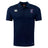 The EMB Canterbury Clover Middle Girls Club Dry Polo is a navy short-sleeve collared shirt with Vapodri Technology for breathability, featuring the Canterbury logo and Clover Rugby crest on the chest.