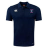The EMB Canterbury Clover Middle Girls Club Dry Polo is a navy short-sleeve collared shirt with Vapodri Technology for breathability, featuring the Canterbury logo and Clover Rugby crest on the chest.