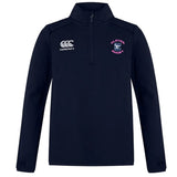 The Clover Middle Girls Club 1/4 Zip Mid Layer Training Top by EMB Canterbury is a navy blue rugby top with a white Canterbury logo on the right chest and a "Clover Rugby" crest on the left—ideal for training sessions.