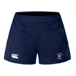 The Clover Middle Girls Women's Advantage Short 2.0 by EMB Canterbury features a navy blue design, white Canterbury logo on the left leg, and a pink/blue Clover Rugby crest on the right, made from recycled athletic material for sustainable training.
