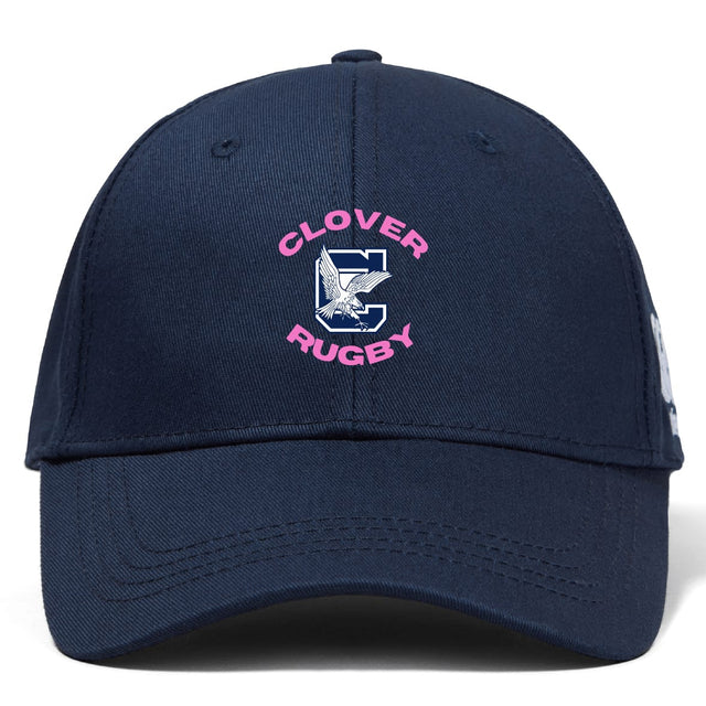 The Clover Middle Girls Flexfit Drill Cap by EMB Canterbury is a navy blue cap featuring pink "Clover Rugby" text and an embroidered eagle logo, inspired by classic Canterbury cap design.