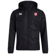 The Chico Oaks Club Vaposhield Full Zip Rain Jacket by EMB Canterbury is a black hooded jacket with a zipper, logo on the left chest, "Canterbury" branding on the right, lightweight mesh lining, and VapoShield water-resistant technology for unpredictable weather.