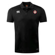 Explore the Chico Oaks Club Dry Polo by EMB Canterbury, a black polo with Vapodri Technology for optimal comfort. It features the Canterbury logo on the right chest and a round red emblem on the left, blending style and performance seamlessly.