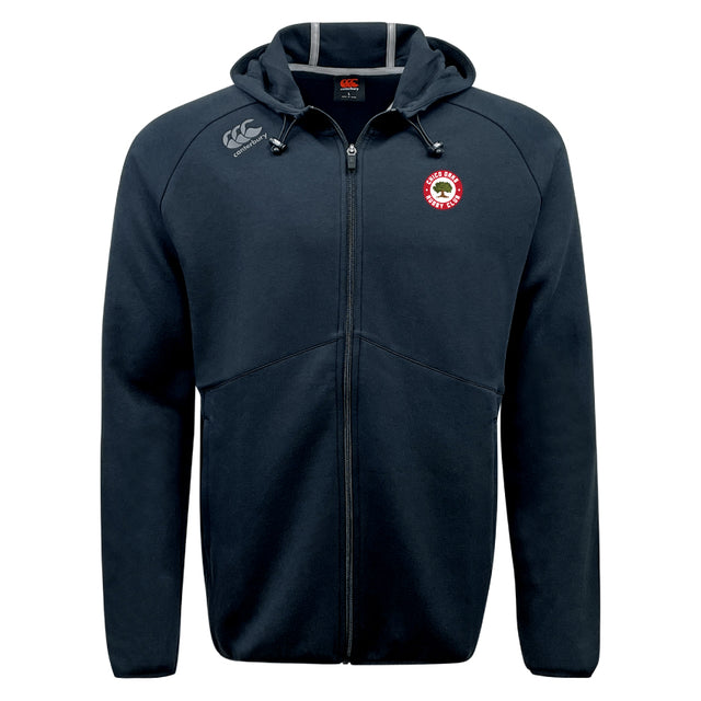 The Chico Oaks Tempo Vapodri Full-Zip Hoodie by EMB Canterbury is a black zip-up jacket with Canterbury logos on the chest and shoulder, designed with moisture-wicking technology for comfort.