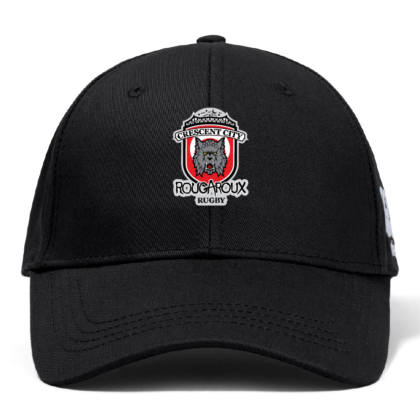 The Crescent City Rougaroux Flexfit Drill Cap by Canterbury from EMB Canterbury is a black baseball hat featuring a wolf logo on the front and a stylish curved brim.