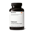 Momentous Calcium is a dietary supplement in a black bottle labeled "Calcium Foundational & Bone Health," containing 60 capsules of absorbable calcium to support bone strength.