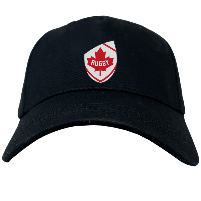 Presenting the Canada Shield Flex Drill Cap by EMB Canterbury: a stylish black cap featuring a bold badge with a red maple leaf and "Rugby." Ideal for any Canadian rugby fan's collection, it's the epitome of style and patriotism.