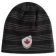 The EMB Canterbury Canada Shield Beanie features black and grey stripes and a shield patch with a red maple leaf—ideal for rugby supporters.