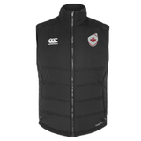 The Canterbury Canada Shield Core Gilet by EMB Canterbury is a black zip-up puffer vest with Thermoreg insulation, featuring a Canterbury logo on the right chest and a maple leaf shield emblem on the left chest.