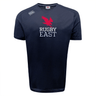 Navy blue Rugby East Conference Tempo Vapodri T-Shirt by WRS Canterbury featuring a red bird graphic and "Rugby East" text on the front. The T-shirt has a "CCC" logo on the right shoulder, a "Canterbury" logo on the left shoulder, and incorporates VapoDri technology for moisture-wicking comfort.